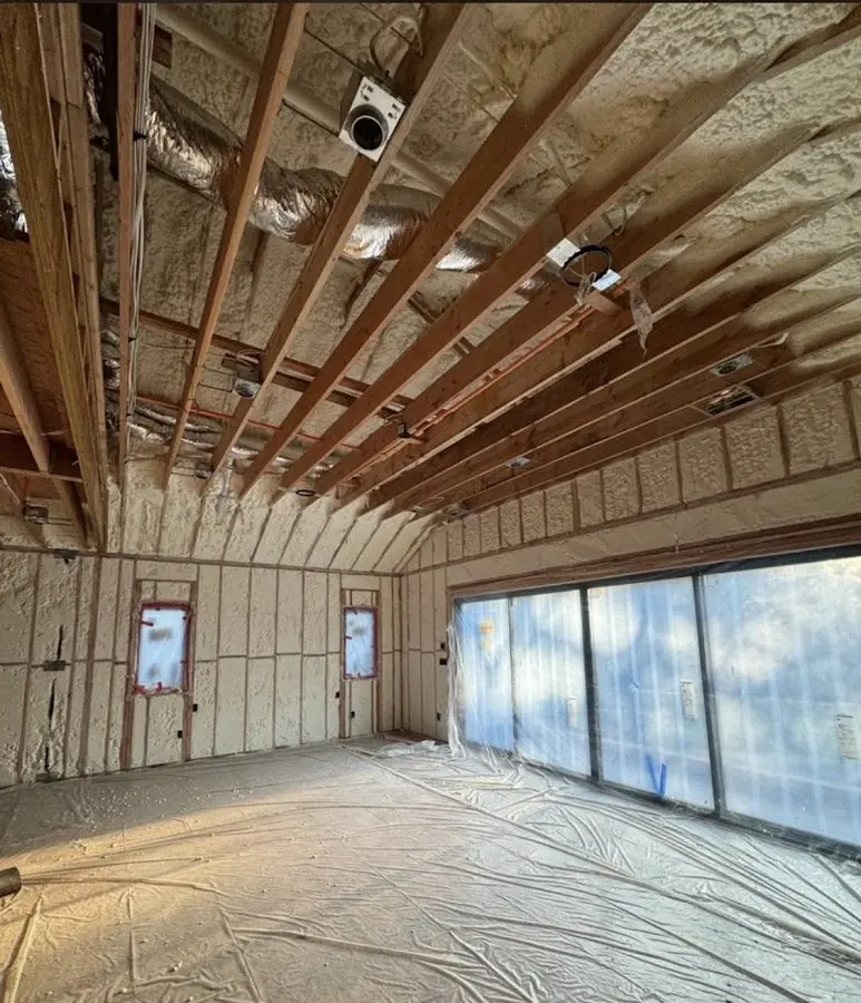 Interior walls and ceiling insulated with spray foam during new construction in Hapeville